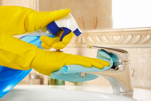 Staff member following safe carpet cleaning practices